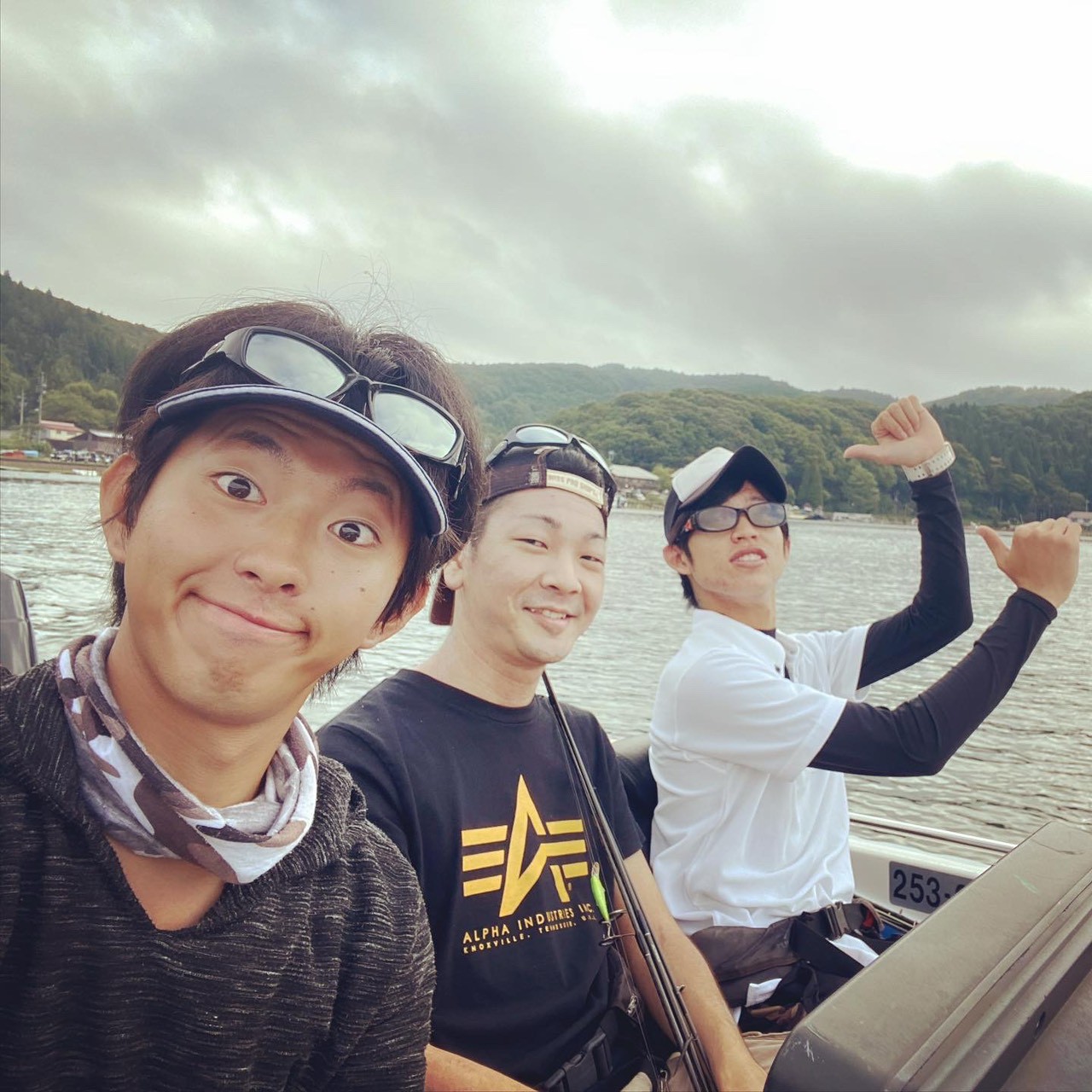 Takumi Harada, Lake Kawaguchi bass fishing guide, on the water with two guests