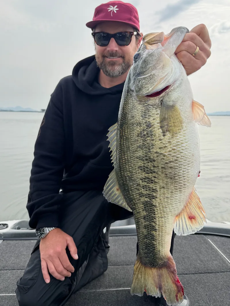 Guest with a Lake Biwa bass, guided by Shogo Kubota